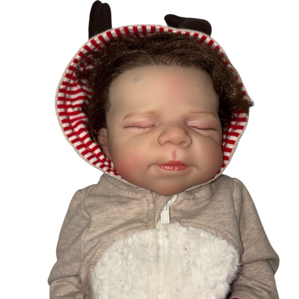 Adorable Baby doll. Looks real. Super cute!
